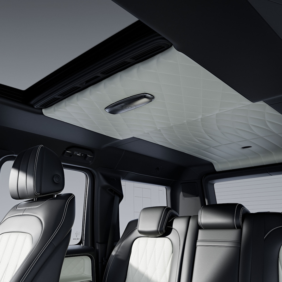 Seitenansicht durch die geöffnete Beifahrertür auf die Vordersitze mit MANUFAKTUR Vollleder-Paket.