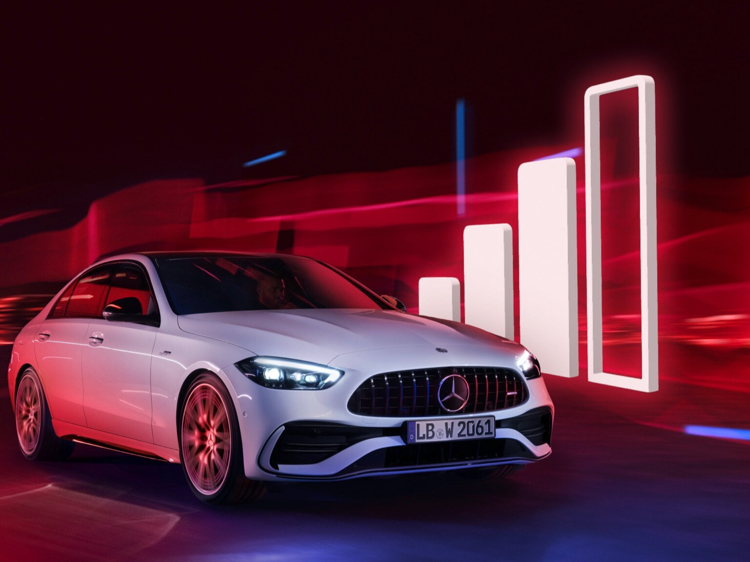 Ein Mercedes-Benz fährt an der Visualisierung eines Empfangsbalken vorbei.