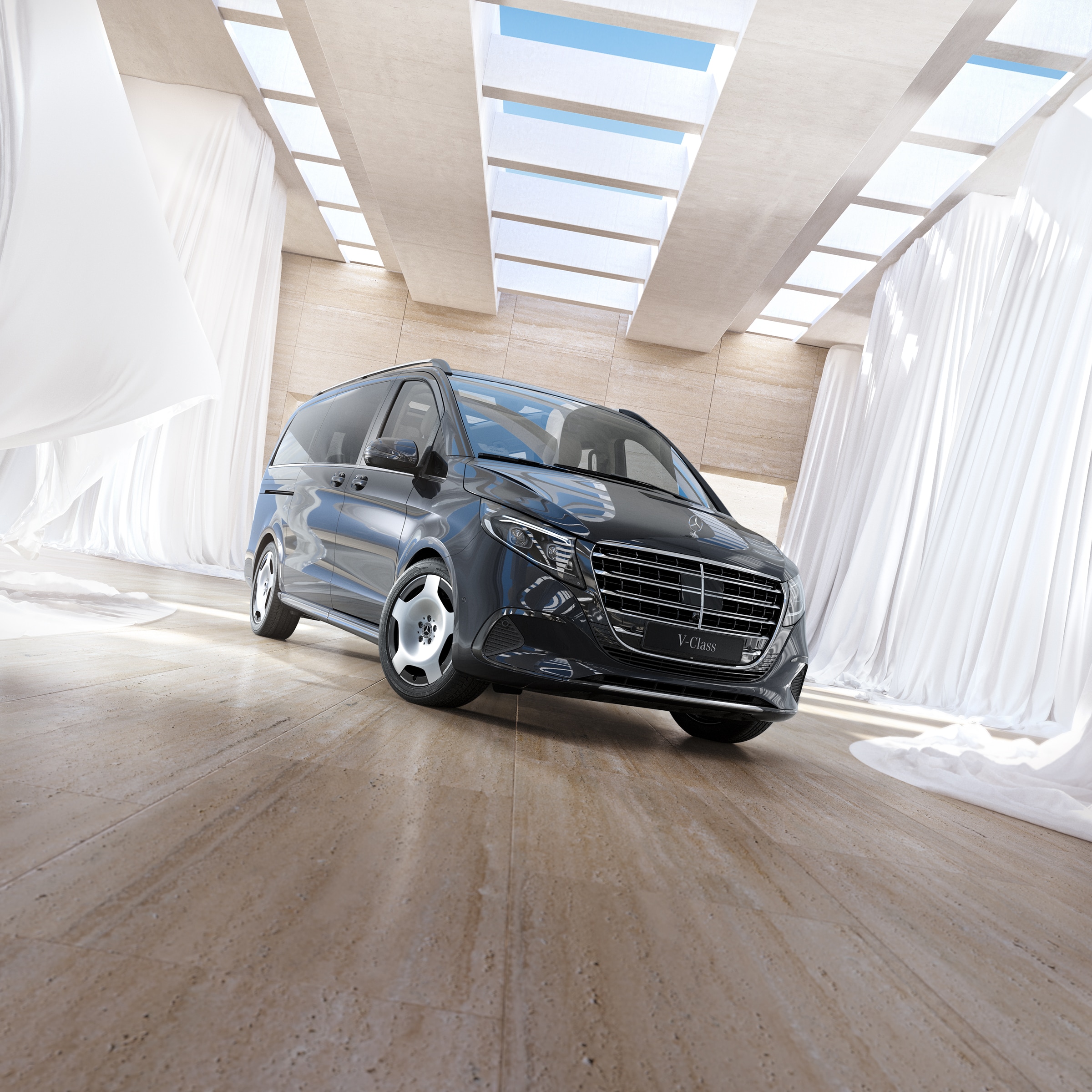 V-Klasse | Geschichte der Nutzfahrzeuge | Mercedes-Benz Mercedes-Benz V-Klasse Personentransporter in einem hellen, modernen Innenraum mit Oberlichtern